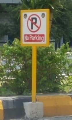 a-no-parking-sign-at-a-certain-location-means